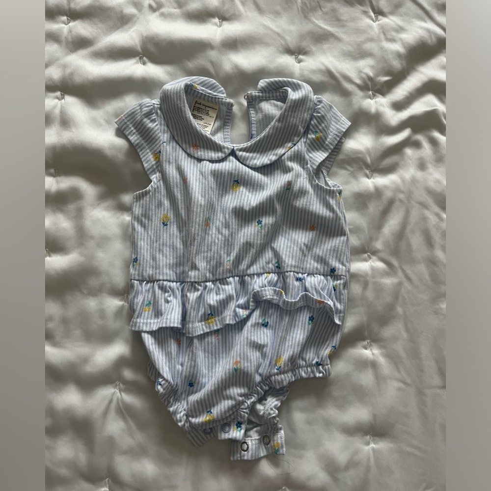 Worn once. Beautiful Onesie